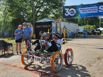 Students from Universidad Católica Boliviana prepare to traverse the course at the 2024 Human Exploration Rover Challenge at the U.S. Space & Rocket Center in Huntsville, Alabama, near NASA's Marshall Space Flight Center. Credits: NASA/Taylor Goodwin